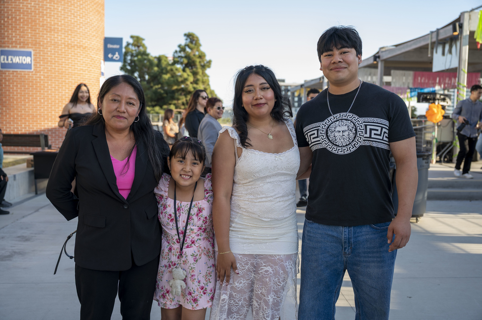 Family at a City College event